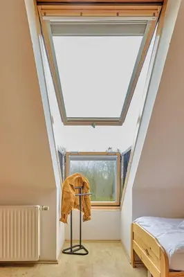 Ein Bett oder Betten in einem Zimmer der Unterkunft Haus Ricker - Dachgeschoss