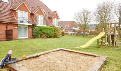 Ein Garten an der Unterkunft Stranddüne - 4