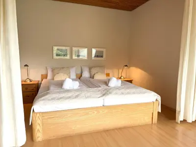 Ein Bett oder Betten in einem Zimmer der Unterkunft Apartmenthaus Frauenpreiss FeWo 214