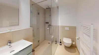 Ein Badezimmer in der Unterkunft Lighthouse Duhner Spitze - W07
