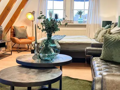 Ein Sitzbereich in der Unterkunft Ferienwohnung Erholung & Meer
