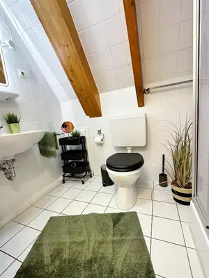 Ein Badezimmer in der Unterkunft Ferienwohnung Erholung & Meer