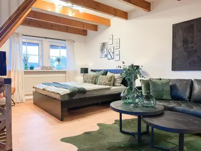 Ein Sitzbereich in der Unterkunft Ferienwohnung Erholung & Meer