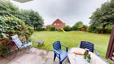 Ein Garten an der Unterkunft Stranddüne - 5