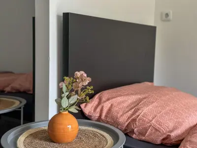 Ein Bett oder Betten in einem Zimmer der Unterkunft Brunsbüttel City Apartments