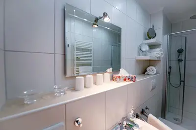 Ein Badezimmer in der Unterkunft Strandhochhaus SHE6