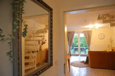 Ein Bett oder Betten in einem Zimmer der Unterkunft Ferienhaus De lüttje Mööv