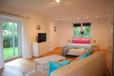 Ein Bett oder Betten in einem Zimmer der Unterkunft Ferienwohnung Am Deich