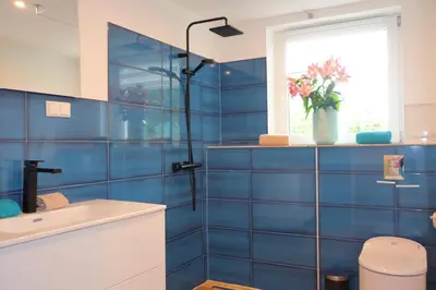 Ein Badezimmer in der Unterkunft Ferienwohnung Am Deich