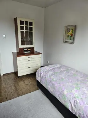 Ein Bett oder Betten in einem Zimmer der Unterkunft Ferienwohnung Majü 1