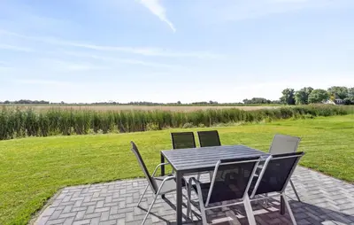 Ein Garten an der Unterkunft Modernes Ferienhaus Mit Sauna