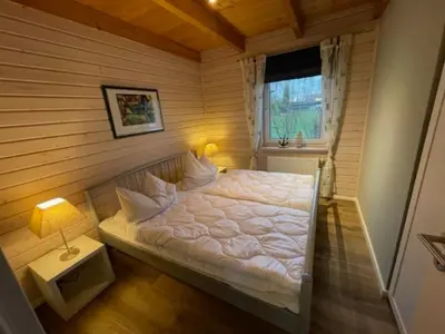 Ein Bett oder Betten in einem Zimmer der Unterkunft Nordsee