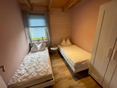 Ein Bett oder Betten in einem Zimmer der Unterkunft Nordsee