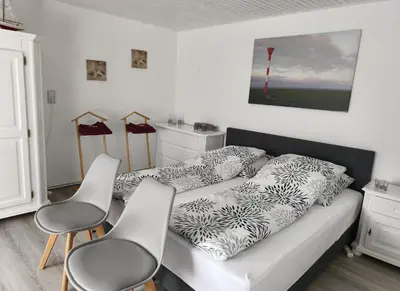 Ein Bett oder Betten in einem Zimmer der Unterkunft Relax-Belum bei Otterndorf LK Cuxhaven