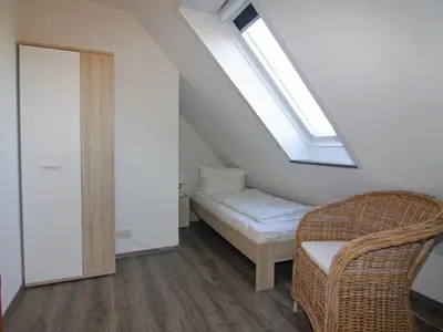 Ein Bett oder Betten in einem Zimmer der Unterkunft Reihenhaus Kleiner Steert in Friedrichskoog-Spitze