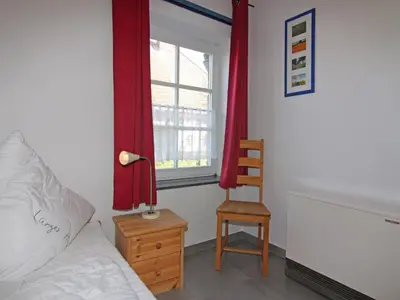 Ein Bett oder Betten in einem Zimmer der Unterkunft Reihenhaus Kleiner Steert in Friedrichskoog-Spitze