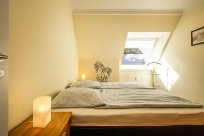 Ein Bett oder Betten in einem Zimmer der Unterkunft Haus Regenpfeifer Wohnung 4
