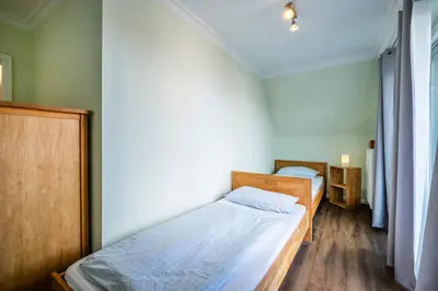 Ein Bett oder Betten in einem Zimmer der Unterkunft Haus Regenpfeifer Wohnung 4