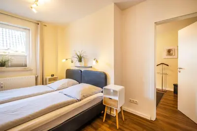 Ein Bett oder Betten in einem Zimmer der Unterkunft Haus Regenpfeifer Wohnung 2