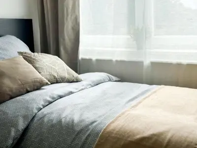 Ein Bett oder Betten in einem Zimmer der Unterkunft Brunsbüttel City Apartments