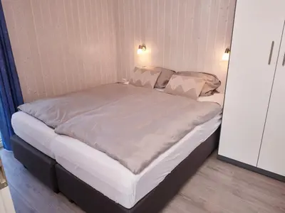 Ein Bett oder Betten in einem Zimmer der Unterkunft 4 star holiday home in FRIEDRICHKOOG