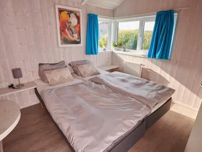 Ein Bett oder Betten in einem Zimmer der Unterkunft 4 star holiday home in FRIEDRICHKOOG