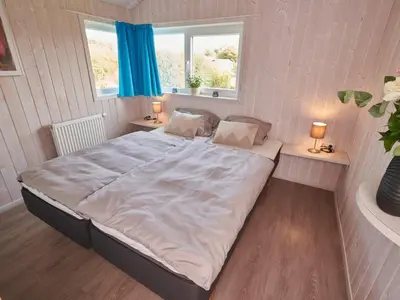 Ein Bett oder Betten in einem Zimmer der Unterkunft 4 star holiday home in FRIEDRICHKOOG