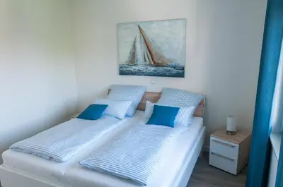 Ein Bett oder Betten in einem Zimmer der Unterkunft Penthouse-Wohnung