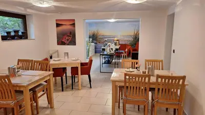 Ein Restaurant oder anderes Speiselokal in der Unterkunft Pension mit Meer