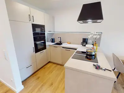 Küche/Küchenzeile in der Unterkunft Zuhause In Duhnen - 204 Viel Watt