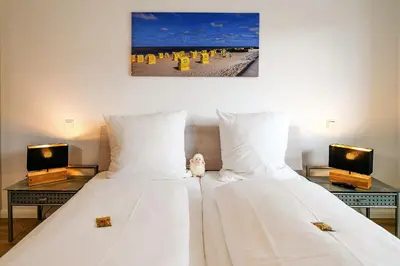 Ein Bett oder Betten in einem Zimmer der Unterkunft Duhner Spitze SP01
