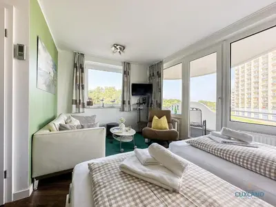 Ein Bett oder Betten in einem Zimmer der Unterkunft Watt n Blick 220