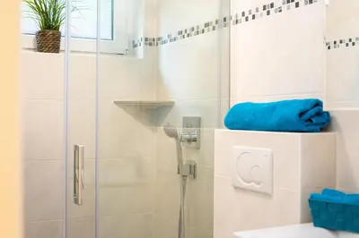 Ein Badezimmer in der Unterkunft Haus Kirsten Duhnen FeWo 1