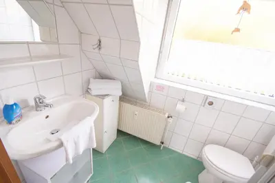 Ein Badezimmer in der Unterkunft Hamburger Str 24 FeWo Möwe 4