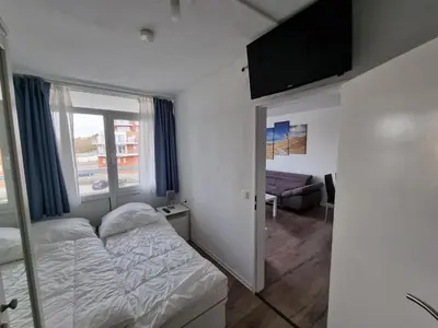 Ein Bett oder Betten in einem Zimmer der Unterkunft Frische Brise FeWo 02 09