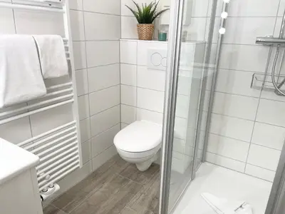 Ein Badezimmer in der Unterkunft Muscheleck FeWo 2