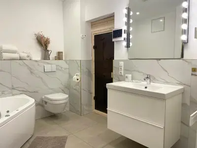 Ein Badezimmer in der Unterkunft Haus Nordseebrandung FeWo 4