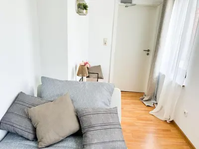 Ein Sitzbereich in der Unterkunft Brunsbüttel City Apartments 1