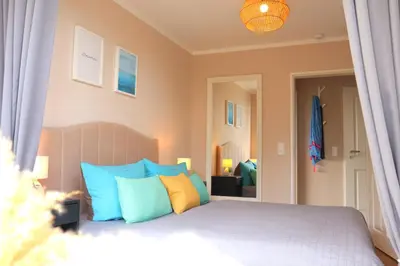 Ein Bett oder Betten in einem Zimmer der Unterkunft Ferienwohnung Sonnenwohnung