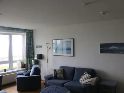 Ein Sitzbereich in der Unterkunft One-bedroom apartment
