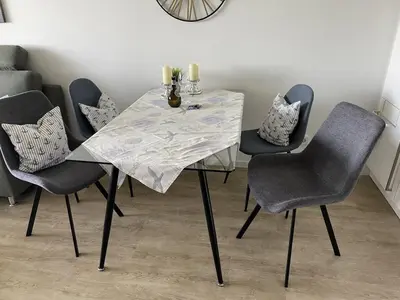 Ein Sitzbereich in der Unterkunft Dike crown in Haus Grimmershörn