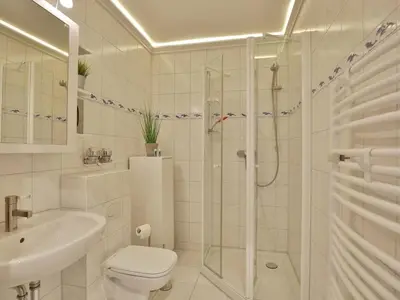 Ein Badezimmer in der Unterkunft Dike crown in Haus Grimmershörn