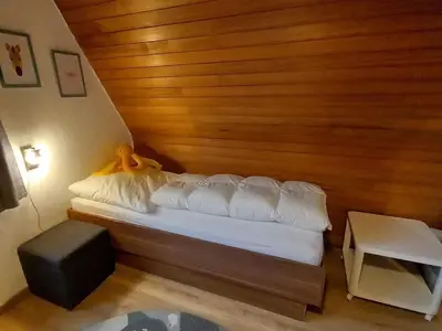 Ein Bett oder Betten in einem Zimmer der Unterkunft Holiday home with 2 bedrooms