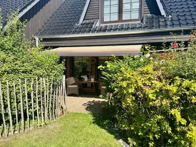 Ein Garten an der Unterkunft Ferienwohnung Leuchtturmliebe Friedrichskoog - Spitze -