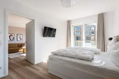Ein Bett oder Betten in einem Zimmer der Unterkunft Ferienwohnung Meerloft