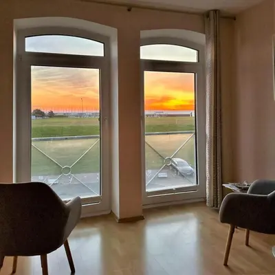 Ein Sitzbereich in der Unterkunft Haus Seewind, App 06