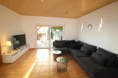Ein Sitzbereich in der Unterkunft Ferienhaus Küstenkind