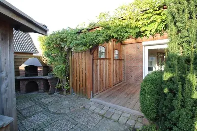 Ein Garten an der Unterkunft Ferienhaus Küstenkind