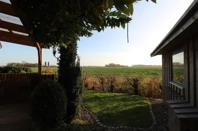 Ein Garten an der Unterkunft Ferienhaus Küstenkind