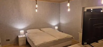 Ein Bett oder Betten in einem Zimmer der Unterkunft Gemütliches Ferienhaus im Herzen von Cuxhaven